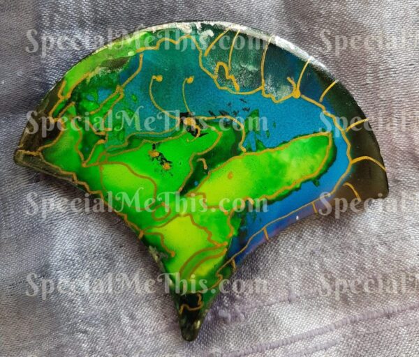A close up of the earth on a pin