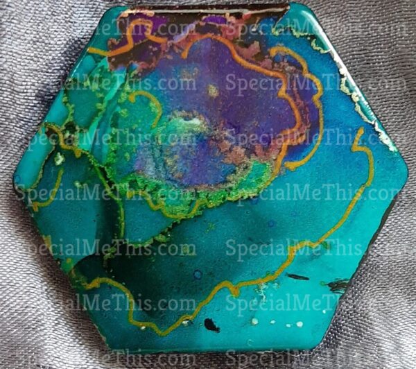 A close up of the top of a compact mirror