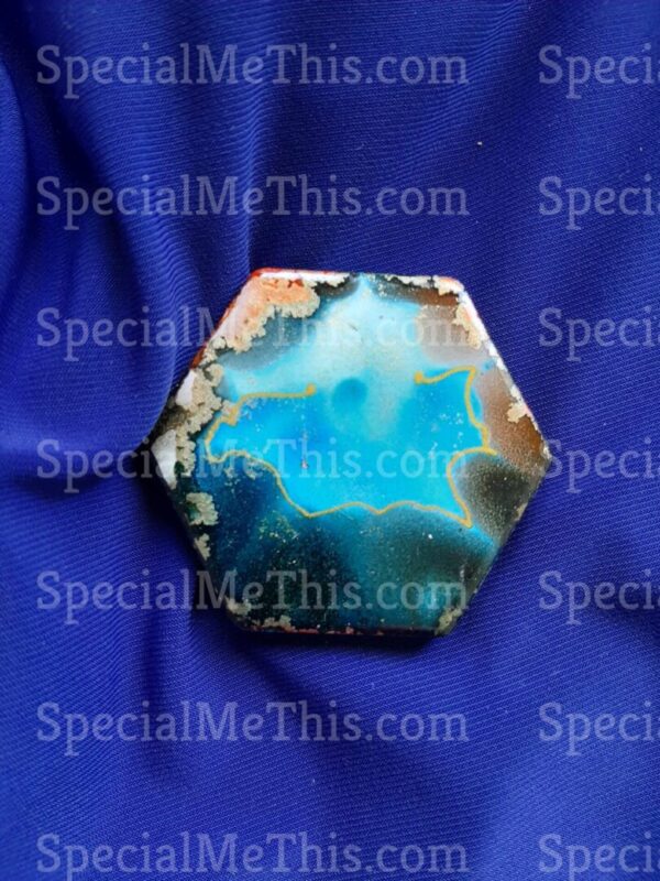 A blue apatite hexahedron on a blue background was replaced by Hexagonal Magnets.