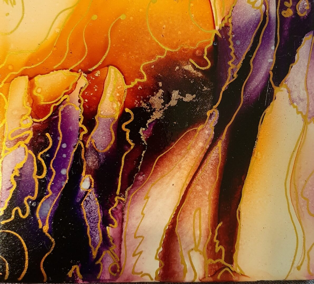 A close up of the painting with purple and yellow colors