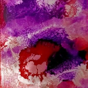 A close up of the purple and red colors in this painting.